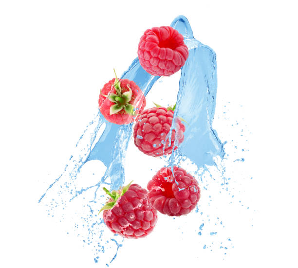 istock raspberries in water splash on a white background 1056423350