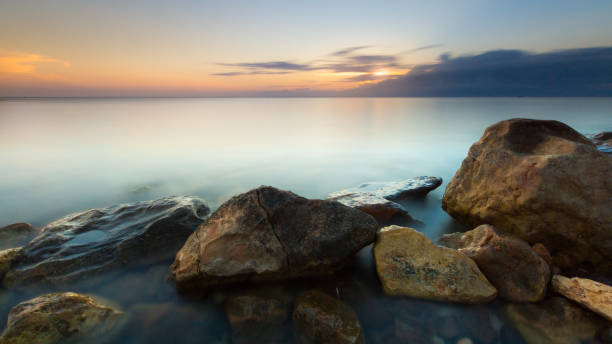 istock Rocks on the beach of La Fabriquilla 1056429136