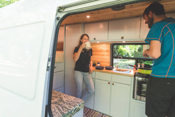 istock Millennial couple living in a van 1056439820