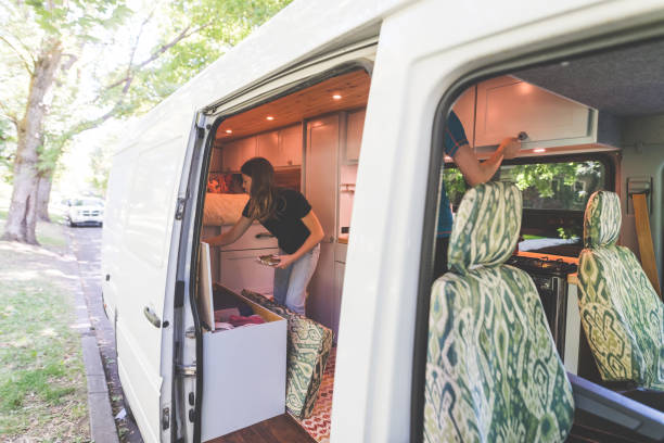 istock Millennial couple living in a van 1056439844