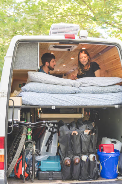 istock Millennial couple living in a van 1056439850