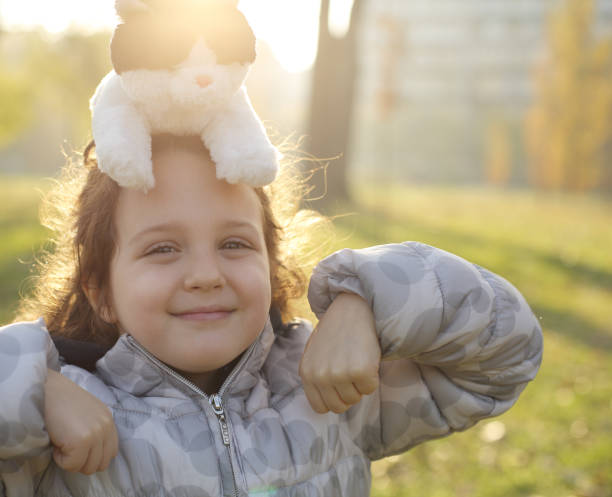 istock Little girl in park 1056440526