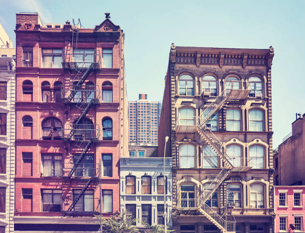 istock Old buildings with fire escapes, New York. 1056443444