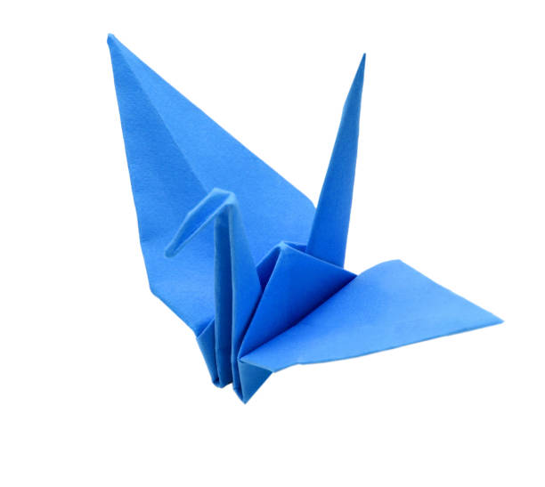 Folded origami bird isolated on white