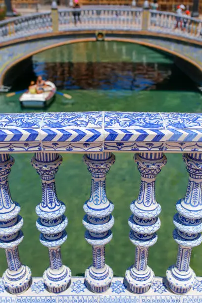 Colored ceramic decoration details at Plaza de Espana, Seville, Andalusia, Spain. Balusters