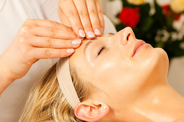 istock Woman enjoying wellness head massage 105644526