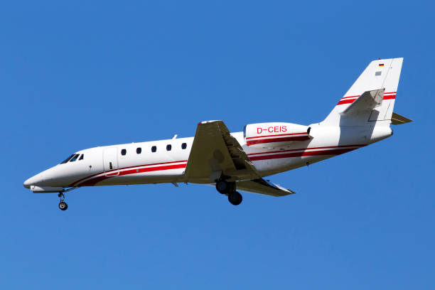 D-CEIS Cessna 680 Citation Sovereign business jet aircraft on the blue sky background stock photo