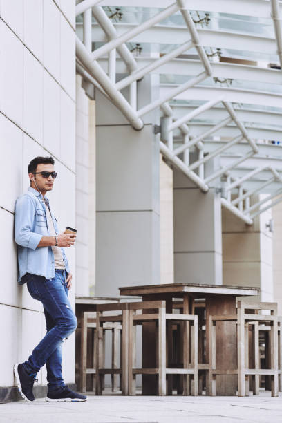 istock Stylish man in the city 1056448882