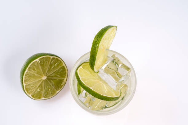 istock Refreshing cocktail with green lemon and ice. 1056459634