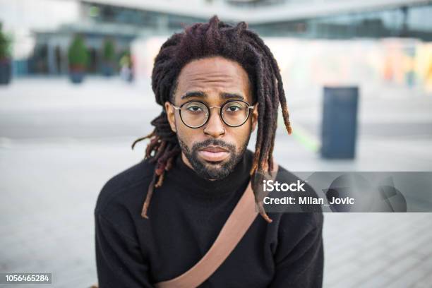 Portrait Of A Young African American Man Stock Photo - Download Image Now - Locs - Hairstyle, Men, Hair