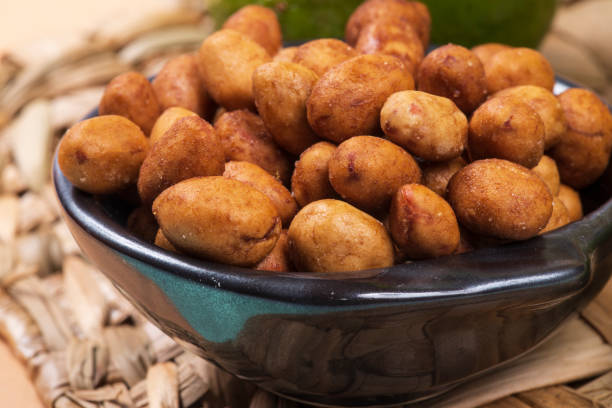 istock Peanuts coated full in the bowl in a bar 1056465454