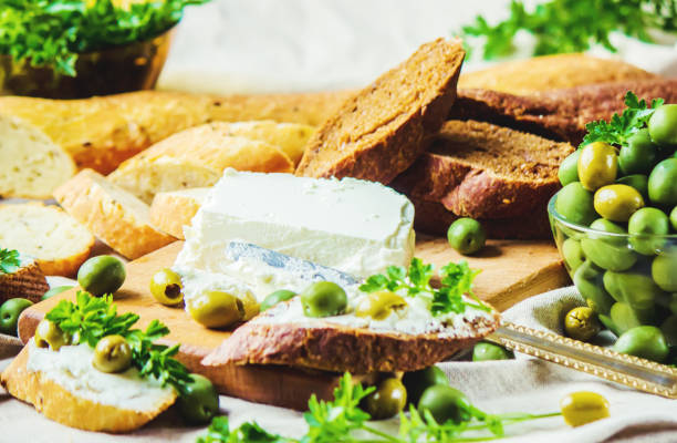 istock sandwiches with cheese and olives. Selective focus. 1056466840