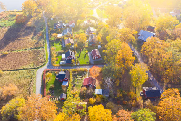 istock Top view, flying over village, low sun 1056468998