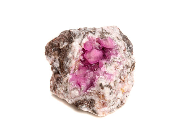 istock Macro mineral stone Cobalt Calcite rock on white background 1056469090