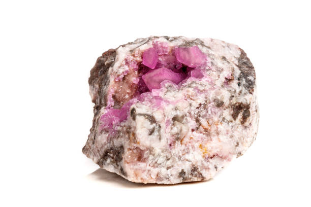 istock Macro mineral stone Cobalt Calcite rock on white background 1056469246