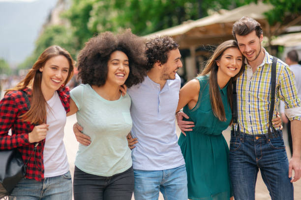 istock Happy friends on the street 1056474214