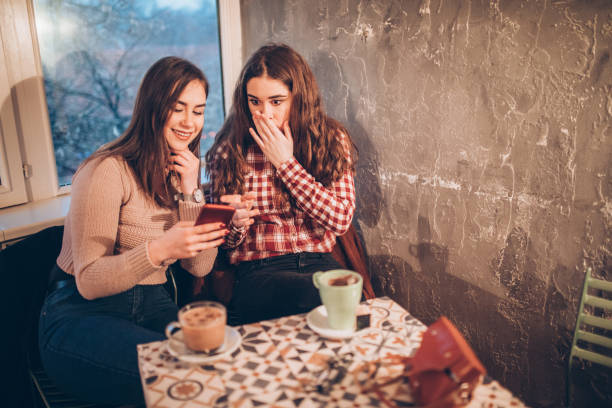 istock Two female friends on a coffee break downtown 1056474294