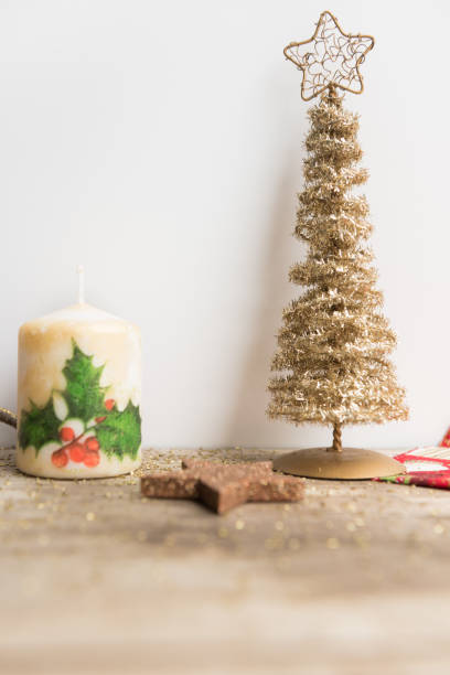istock Christmas decoration on white and wooden background 1056483344