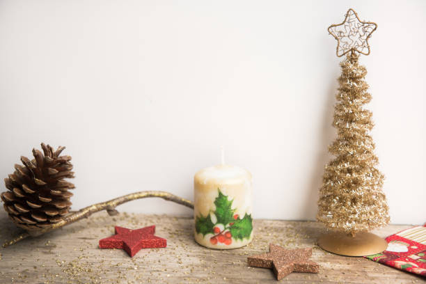 istock Christmas decoration on white and wooden background 1056483346