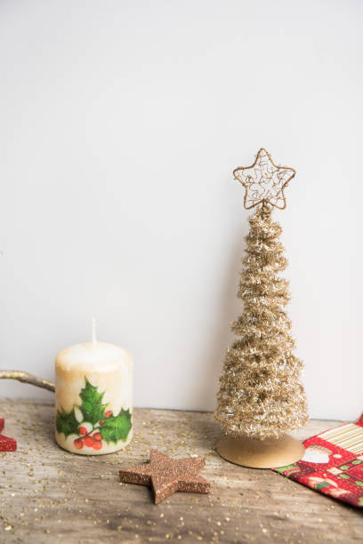 istock Christmas decoration on white and wooden background 1056483354