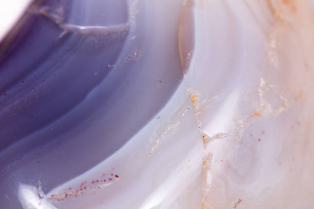 istock Macro mineral stone Agate Botswana gray on white background 1056486086