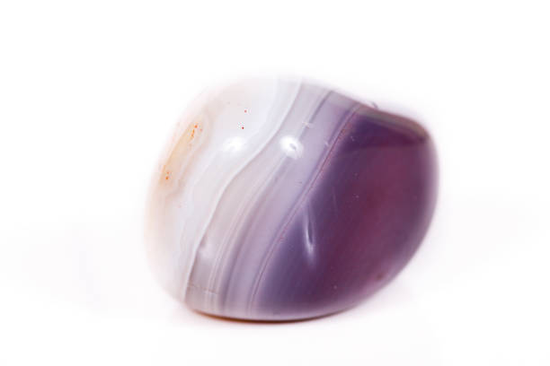 istock Macro mineral stone Agate Botswana gray on white background 1056487528