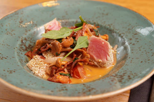 istock Fried salami, mushrooms and tuna 1056488004