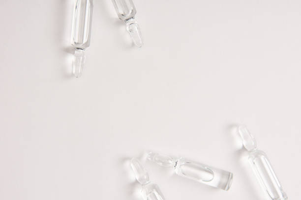 istock elevated view of ampoules with medical liquid on white surface 1056488550