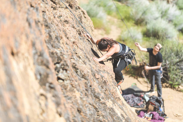 istock Female rock climbing in central Oregon 1056491318