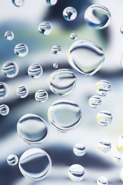 istock close-up view of beautiful transparent water drops on light blurred background 1056492410