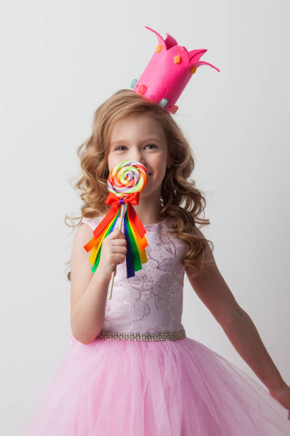 istock Candy princess girl with lollipop 1056492746