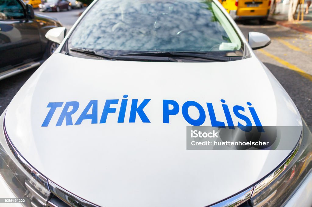 Police car from the turkish police Trafik Polisi stands on a street Blue Stock Photo