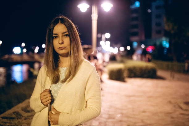 istock Young woman on the riverbank 1056497126