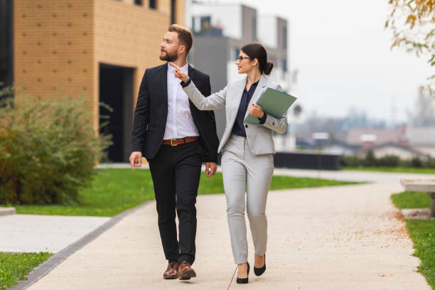 istock A female real estate agent with her client 1056500222