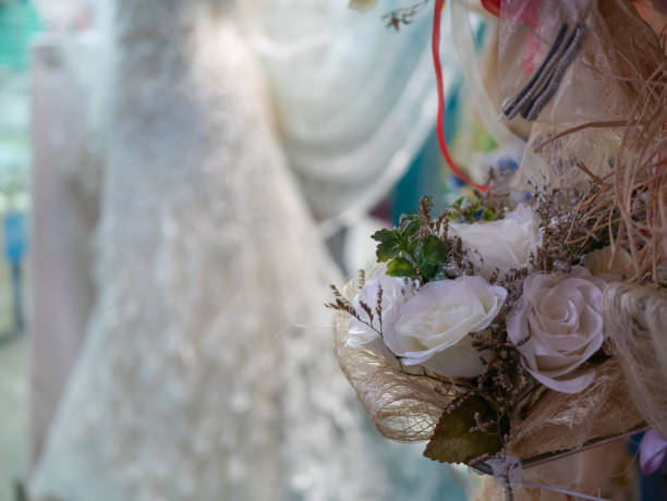 istock small bouquet of white roses for wedding 1056502104