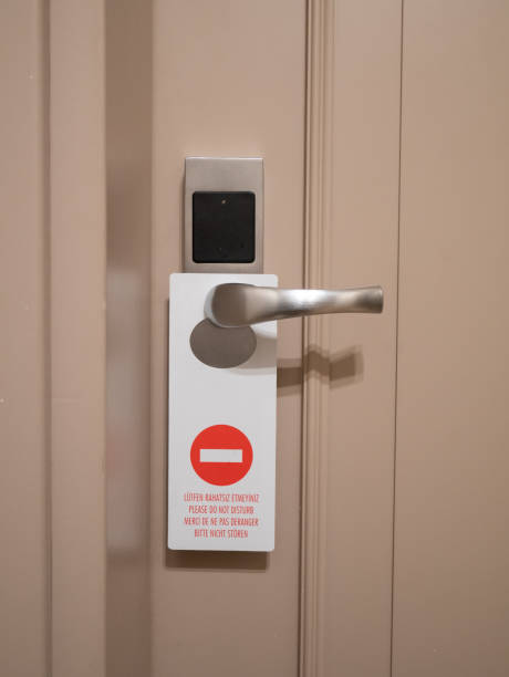 istock do not disturb hotel sign on door lock 1056502136