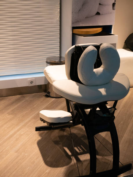 istock modern massage chair in beauty salon for fast service 1056502158