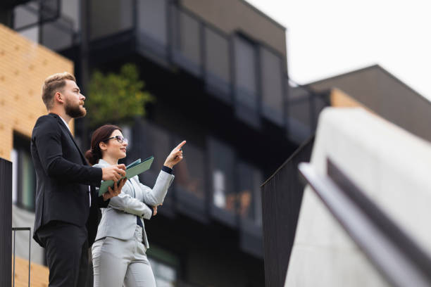 istock Real estate agent on a meeting 1056502202