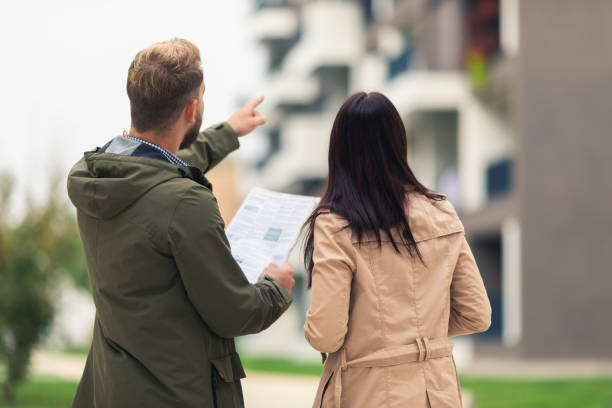 istock Young couple searching for an apartment 1056504440