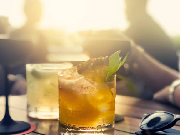 Cocktails on a table at a bar.