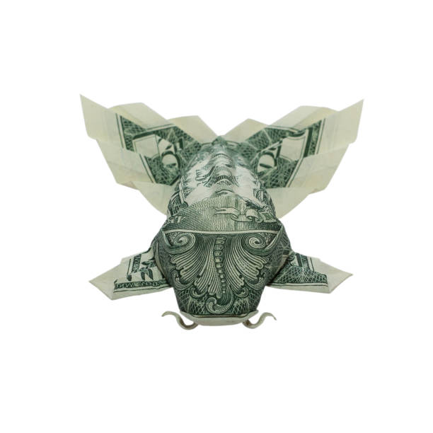 istock Money Origami KOI FISH with Fluffy Tail Folded with Real One Dollar Bill Isolated on White Background 1056512420