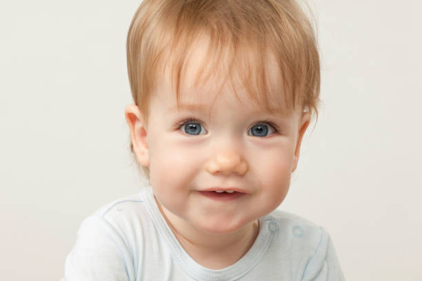 istock studio portrait of a baby boy on white background 1056512456