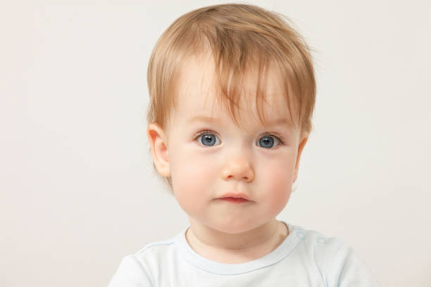 istock studio portrait of a baby boy on white background 1056512480