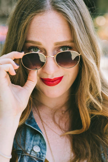 istock Millennial Female Portrait with Sunglasses 1056530238