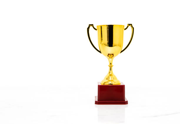 istock Golden trophy cup isolated on white background. 1056539308