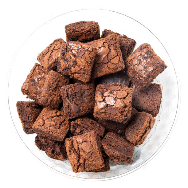Heap of chocolate brownie cookies Heap of chocolate brownie cookies on white background from above chocolate cake photos stock pictures, royalty-free photos & images
