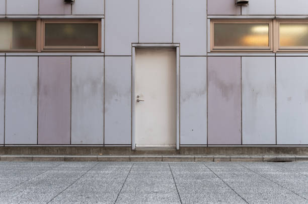 sidewalk by street wall & door