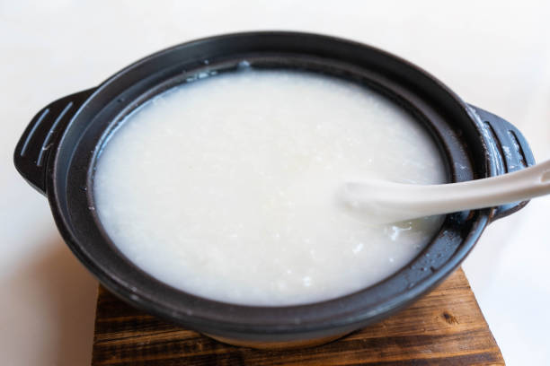 istock plain rice porridge in clay pot 1056553790