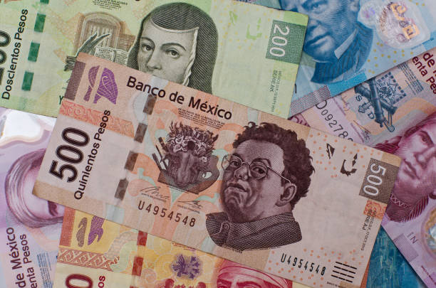 Different Mexican money background. stock photo