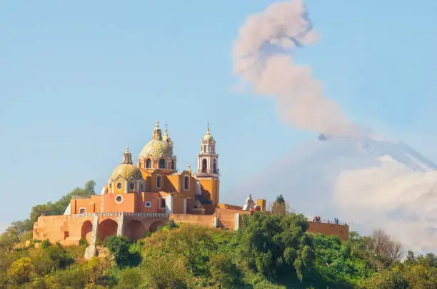 Church of Our Lady of Remedies in Cholula with Popocatepetl Volcano , Mexico